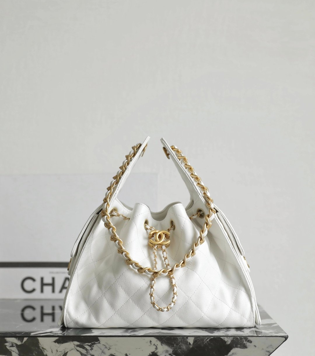 Chanel 25 Small Hobo Bag in White/Caviar leather detail image 1 sourced from womanlvbag.com