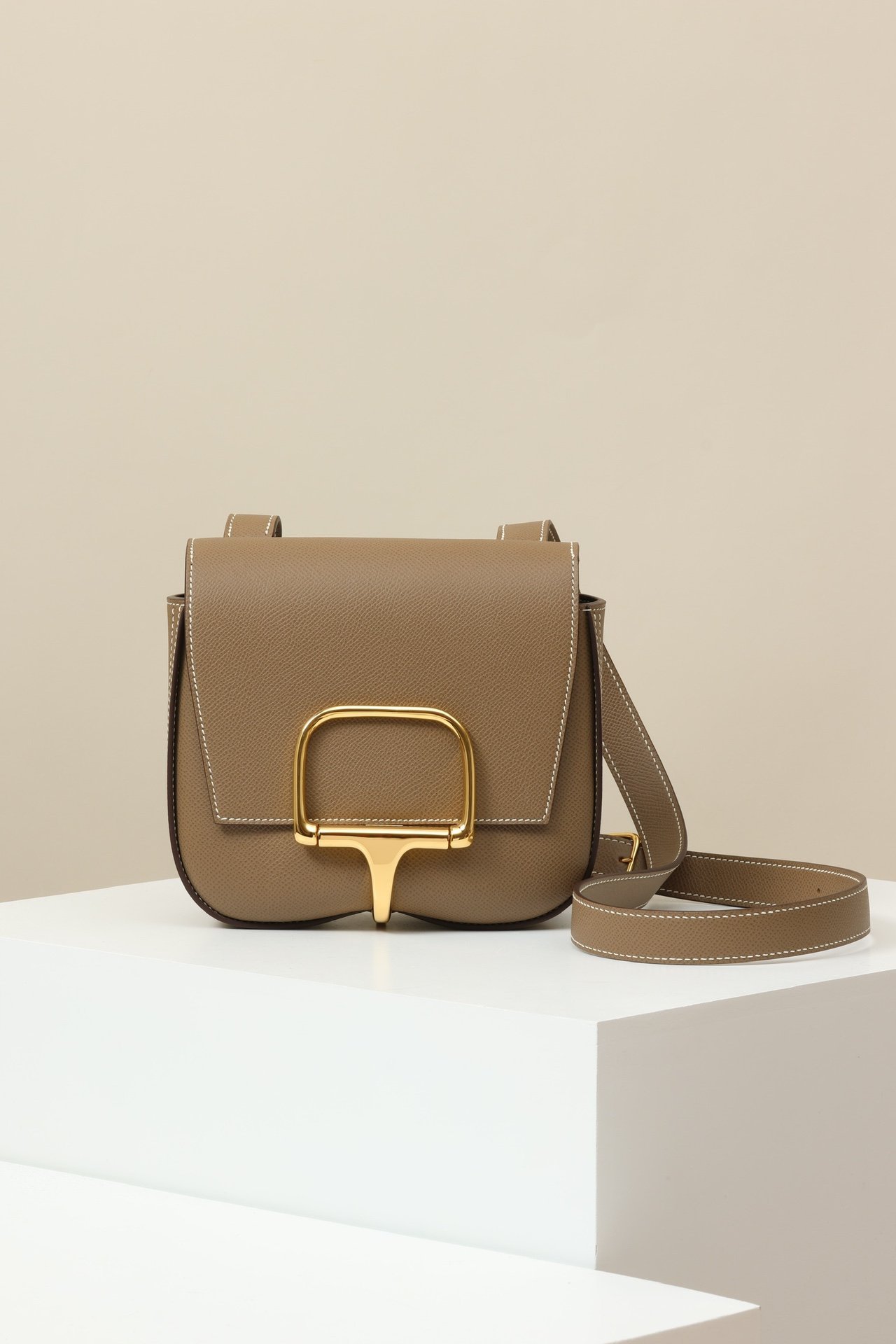 Hermès Della Cavalleria Mini – Epsom Leather CK18 Etoupe GHW comparison image 1 sourced from womanlvbag.com