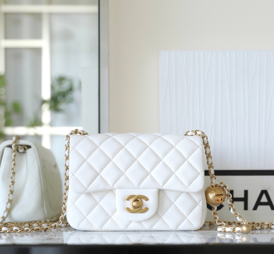 CHANEL Mini Square "Golden Ball" Adjustable Flap Bag – White Lambskin with 24K Vintage Gold Hardware detail image 1 sourced from womanlvbag.com