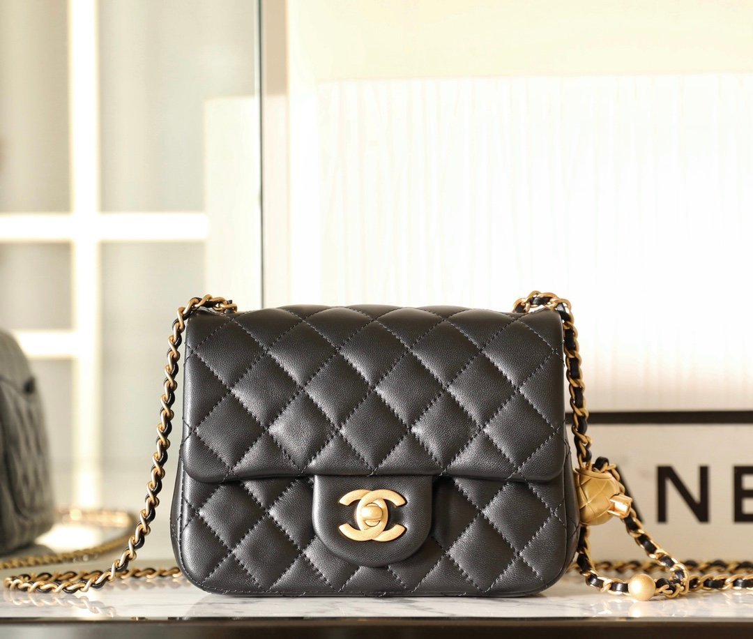 CHANEL Mini Square "Golden Ball" Adjustable Flap Bag – Black Lambskin with 24K Vintage Gold Hardware detail image 1 sourced from womanlvbag.com