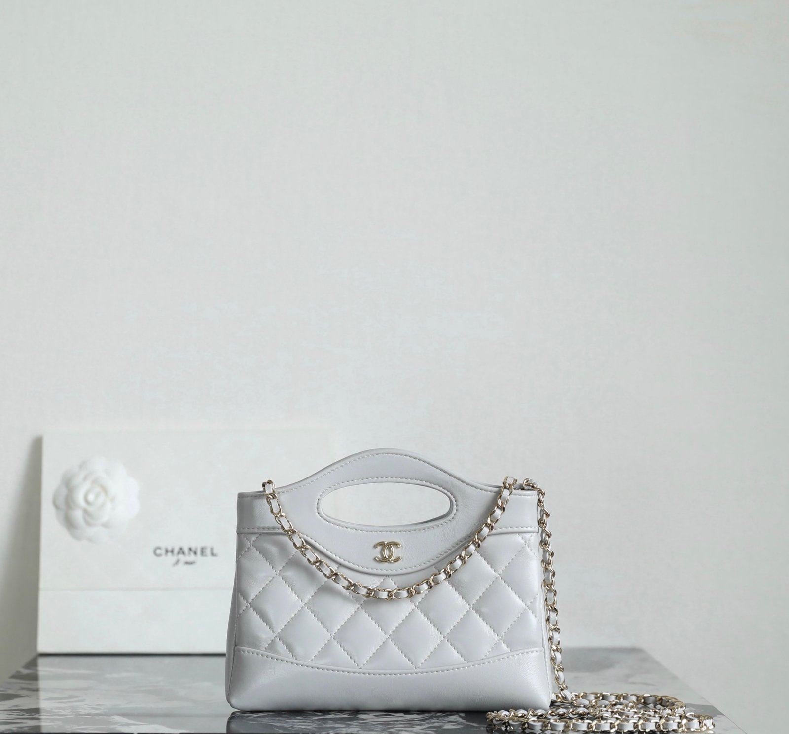 CHANEL 31 Nano Shopping Bag, a miniature version of the archival '31' silhouette detail image 1 sourced from womanlvbag.com