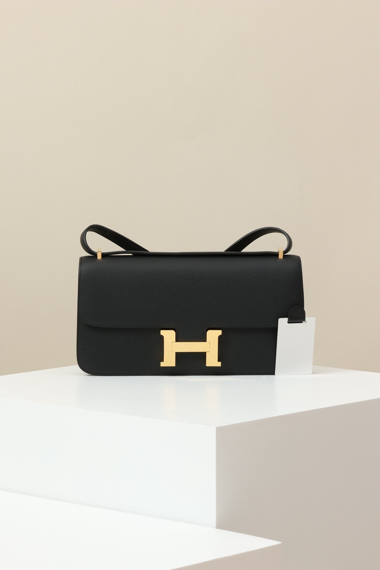 Hermès Constance Elan – Epsom Calfskin 89 Noir GHW detail image 1 sourced from womanlvbag.com