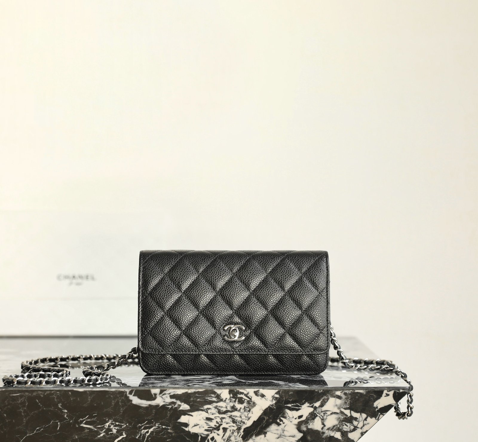 CHANEL Classic Wallet On Chain (WOC) – Black Caviar Leather with Polished Silver Hardware detail image 1 sourced from womanlvbag.com