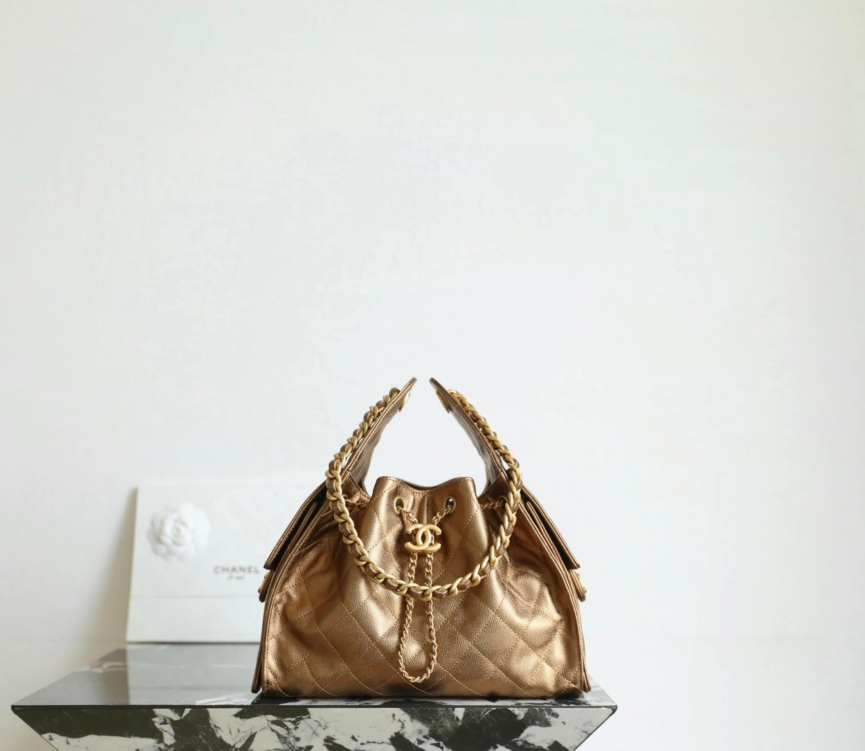 Chanel 25 Small Hobo Bag Antique Gold detail image 2 sourced from womanlvbag.com