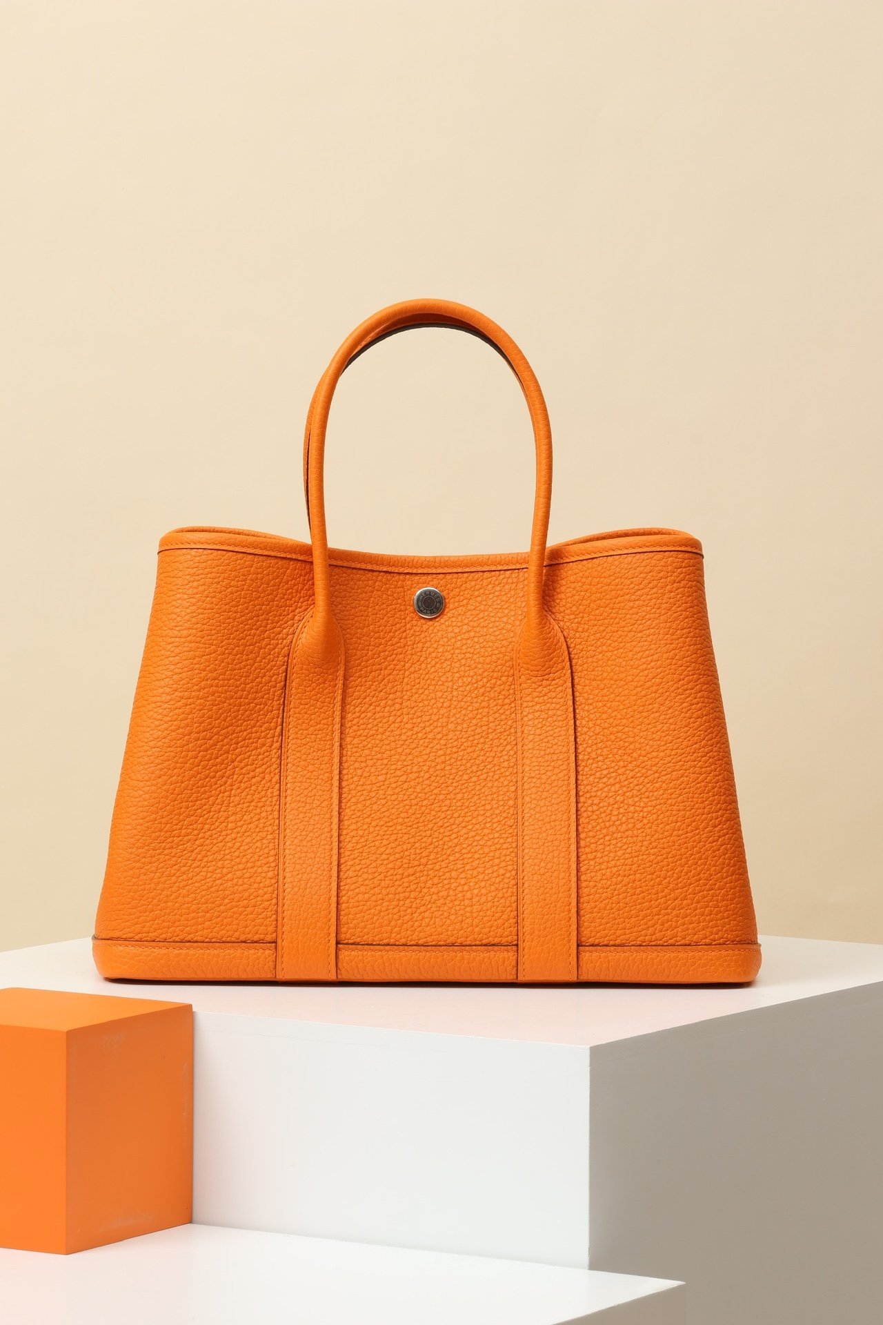Hermès Garden Party 30 – Negonda Orange H (93) PHW comparison image 2 sourced from womanlvbag.com