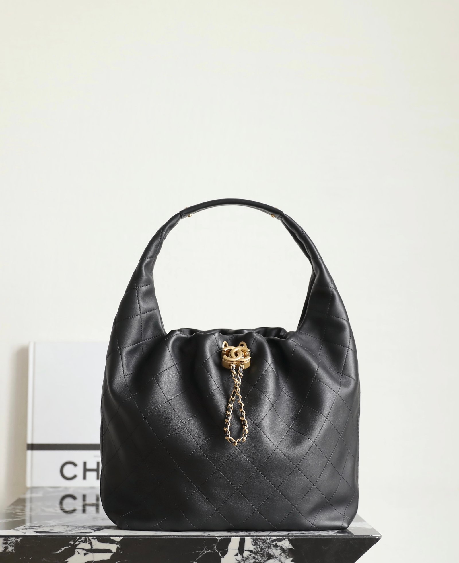 CHANEL Large Hobo Handbag – Black Hippie Calfskin with 24K Vintage Gold & CC Adjuster detail image 1 sourced from womanlvbag.com