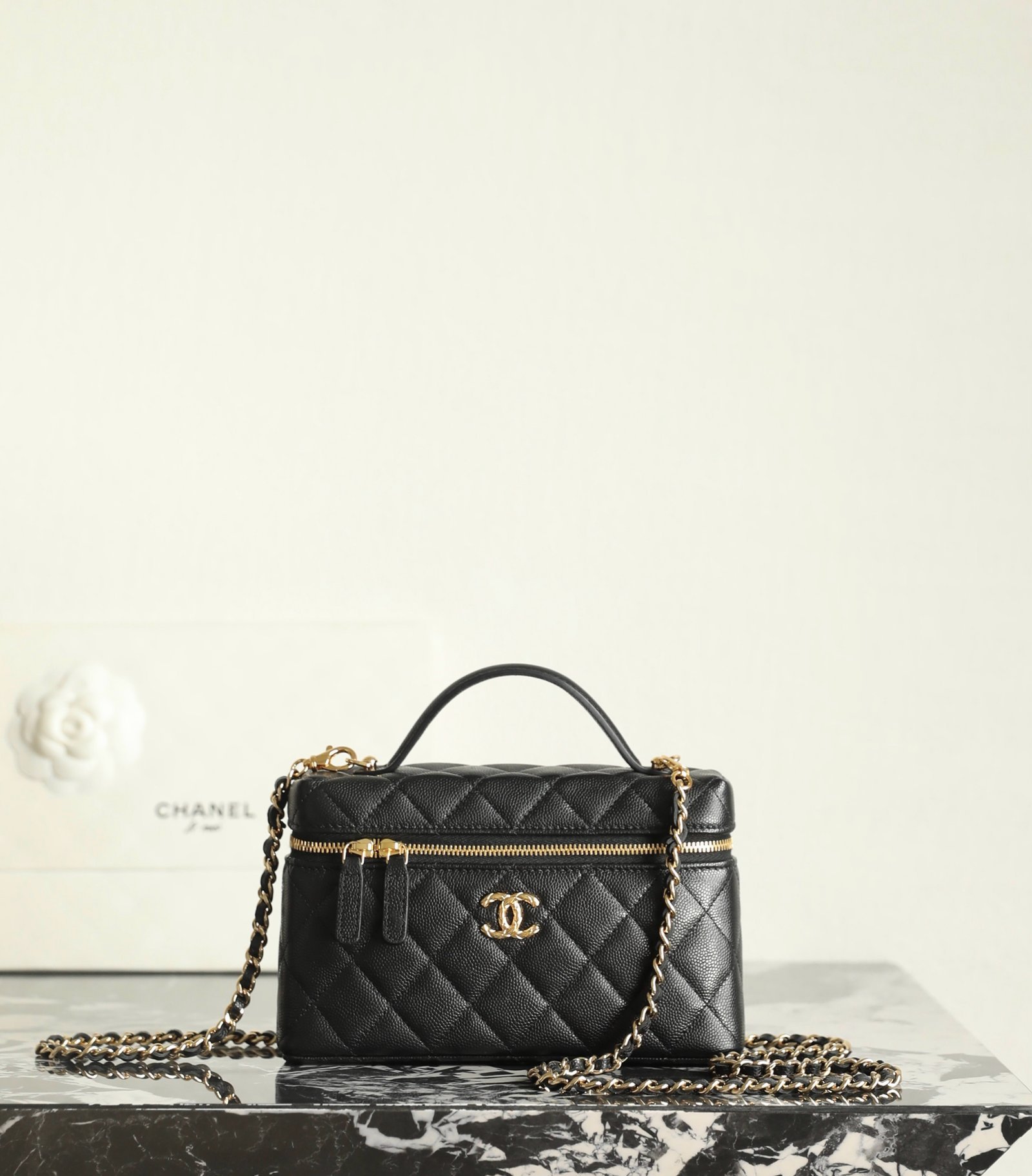 CHANEL Vanity Case with Chain – Black Caviar Leather with 24K Polished Gold Hardware detail image 1 sourced from womanlvbag.com