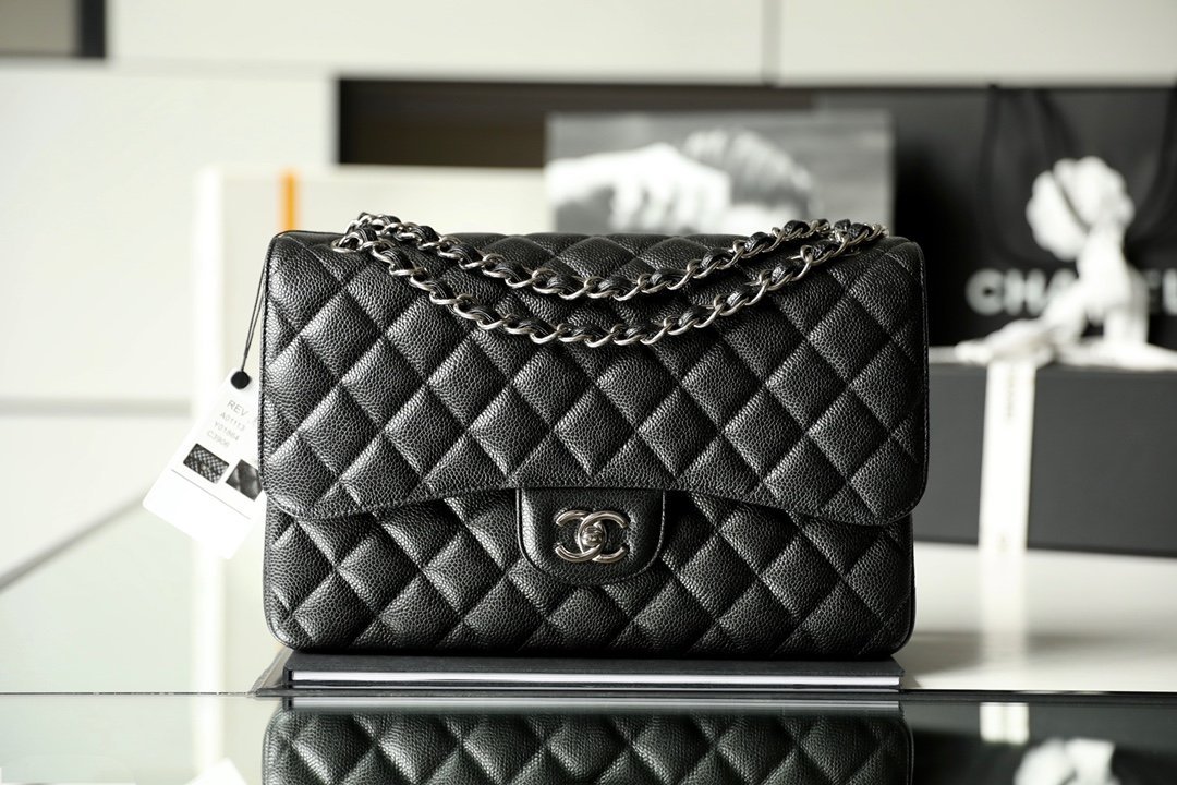 CHANEL Jumbo Classic Double Flap Bag – Black Caviar Leather with Silver-Tone Hardware detail image 1 sourced from womanlvbag.com