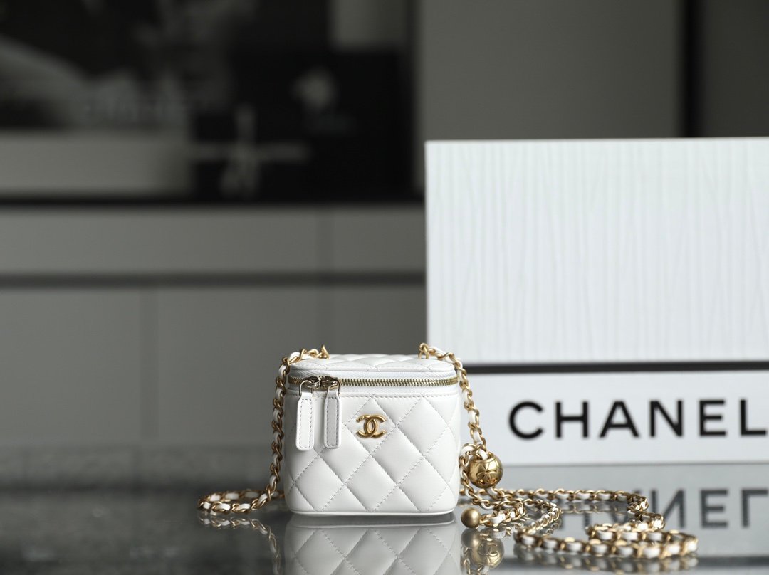 CHANEL Mini Zip Lipstick "Golden Ball" Bag – White Lambskin with 24K Vintage Gold Hardware detail image 1 sourced from womanlvbag.com