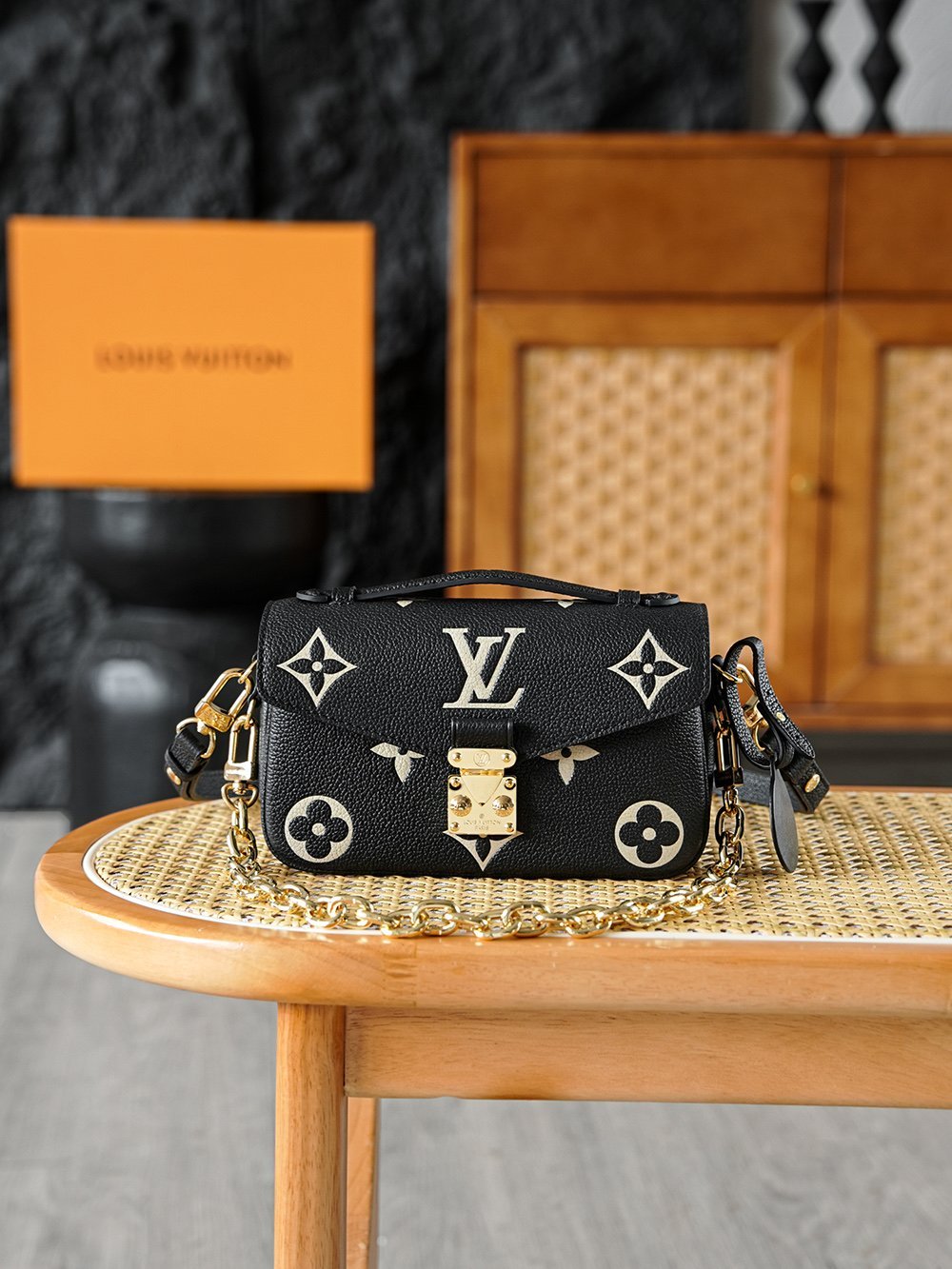 Louis Vuitton Pochette Métis East West – Bicolor Giant Monogram Empreinte in Black & Beige (M46596) detail image 1 sourced from womanlvbag.com