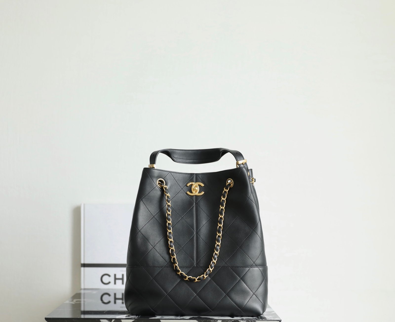 CHANEL Trendy CC Vertical Hobo – Black Calfskin & 24K Vintage Shiny Gold detail image 1 sourced from womanlvbag.com
