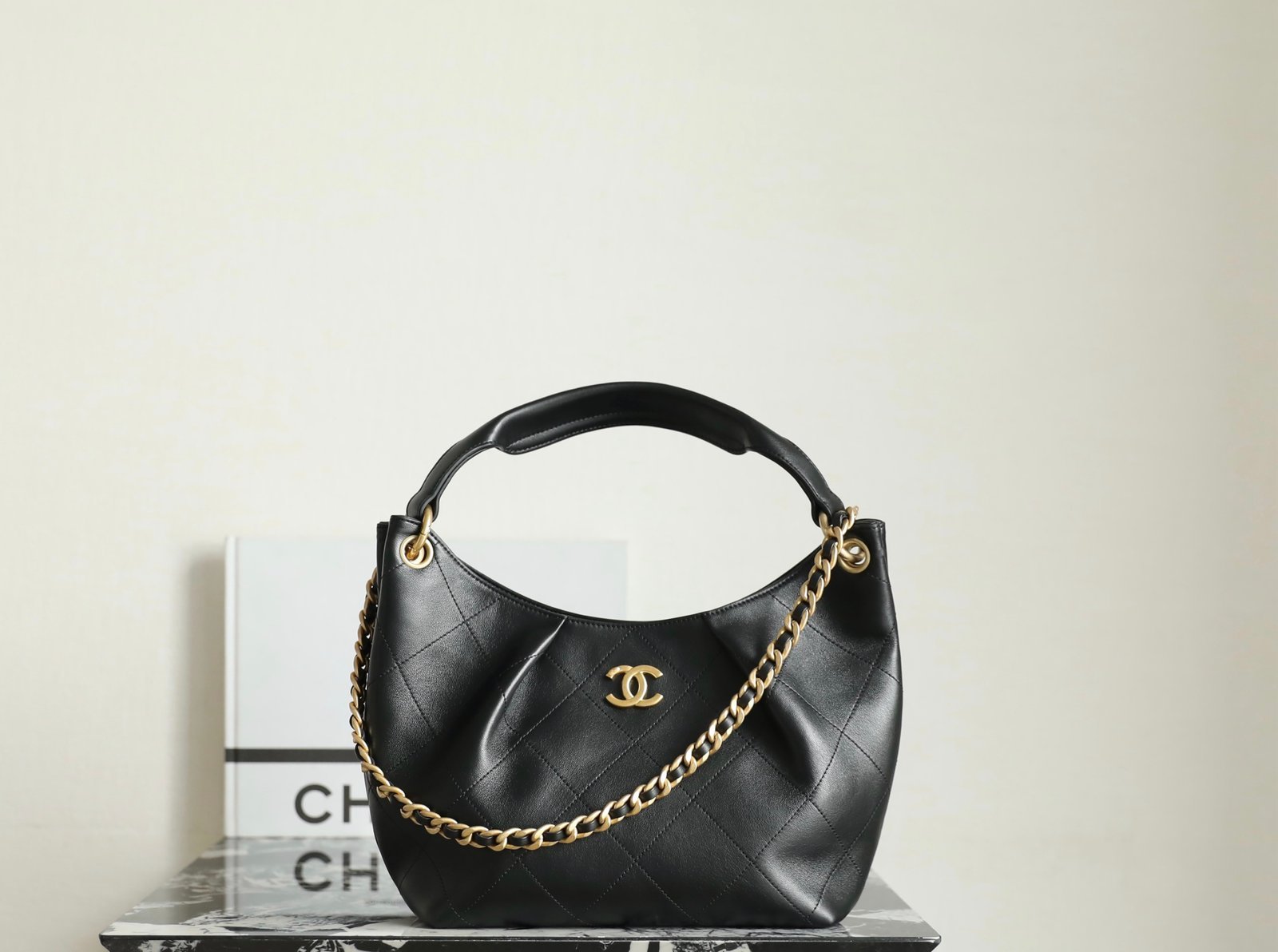 CHANEL Small Hobo Handbag – 2025/26 Black Lambskin & 24K Vintage Gold detail image 1 sourced from womanlvbag.com