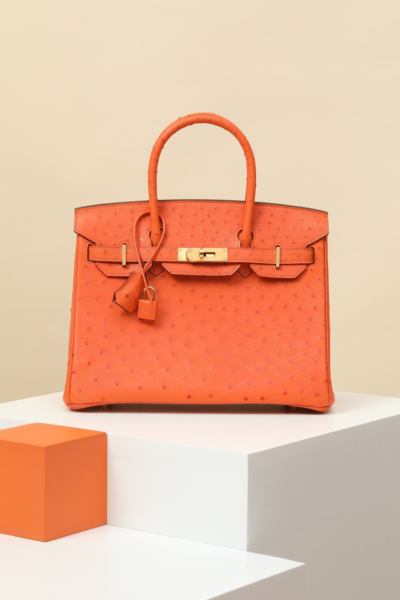 Hermès Birkin 30 in 93 Orange H, the brand's signature house color detail image 1 sourced from womanlvbag.com