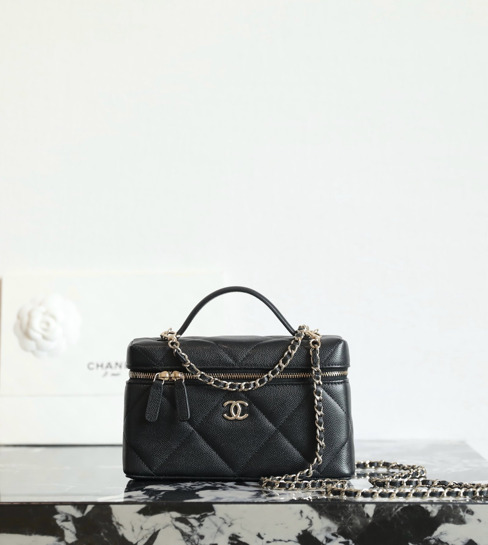 CHANEL Vanity Case with Chain – Black Caviar Leather with 14K Light Gold Hardware detail image 1 sourced from womanlvbag.com