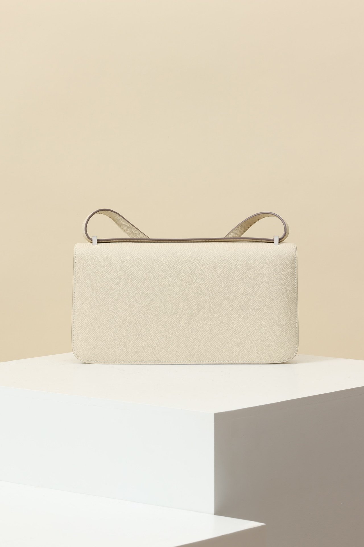 Hermès Constance Elan – Epsom Calfskin 10 Craie PHW detail image 2 sourced from womanlvbag.com