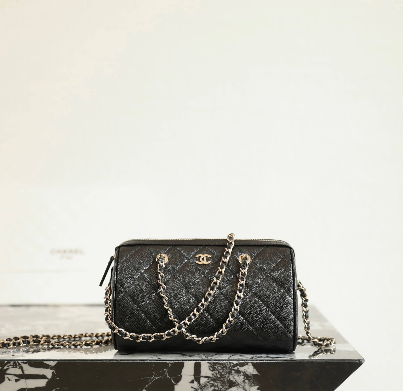 CHANEL Mini Bowling Bag – Black Caviar & 14K Light Gold detail image 1 sourced from womanlvbag.com