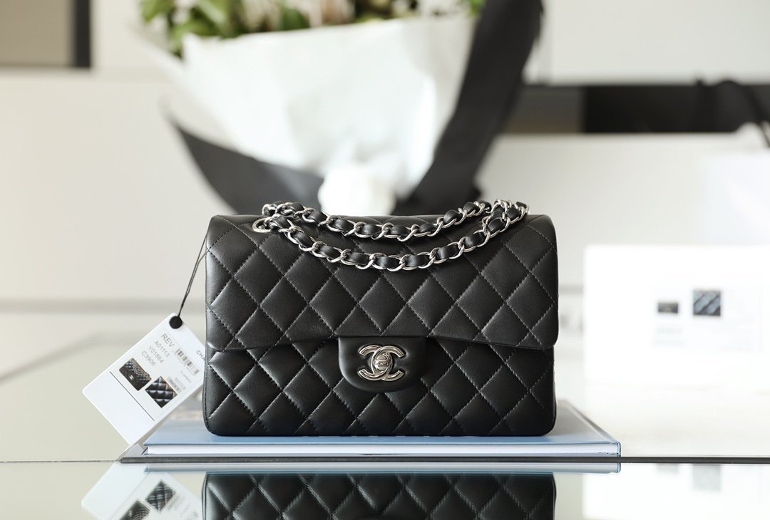 CHANEL Small Classic Double Flap Bag – Black Lambskin Leather with Silver-Tone Hardware detail image 1 sourced from womanlvbag.com
