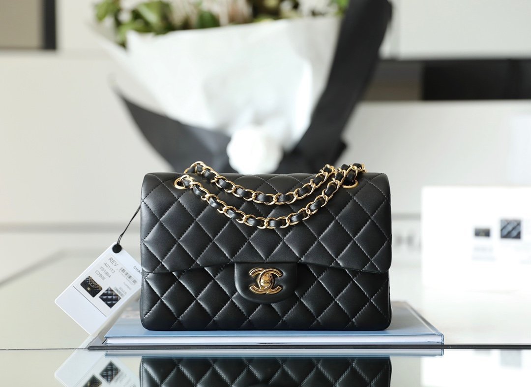 CHANEL Small Classic Double Flap Bag – Black Lambskin Leather with 24K Shiny Gold Hardware detail image 1 sourced from womanlvbag.com
