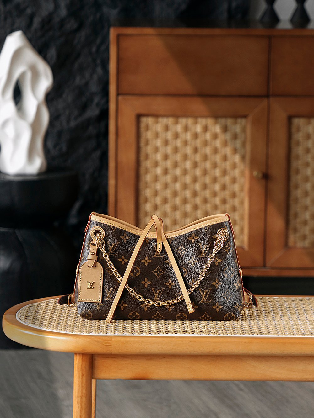 Louis Vuitton CarryAll detail image 1 sourced from womanlvbag.com