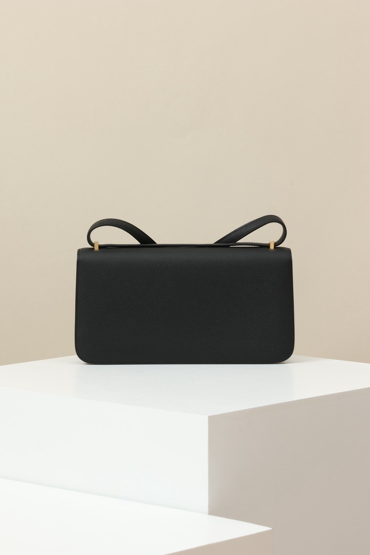 Hermès Constance Elan – Epsom Calfskin 89 Noir GHW detail image 2 sourced from womanlvbag.com