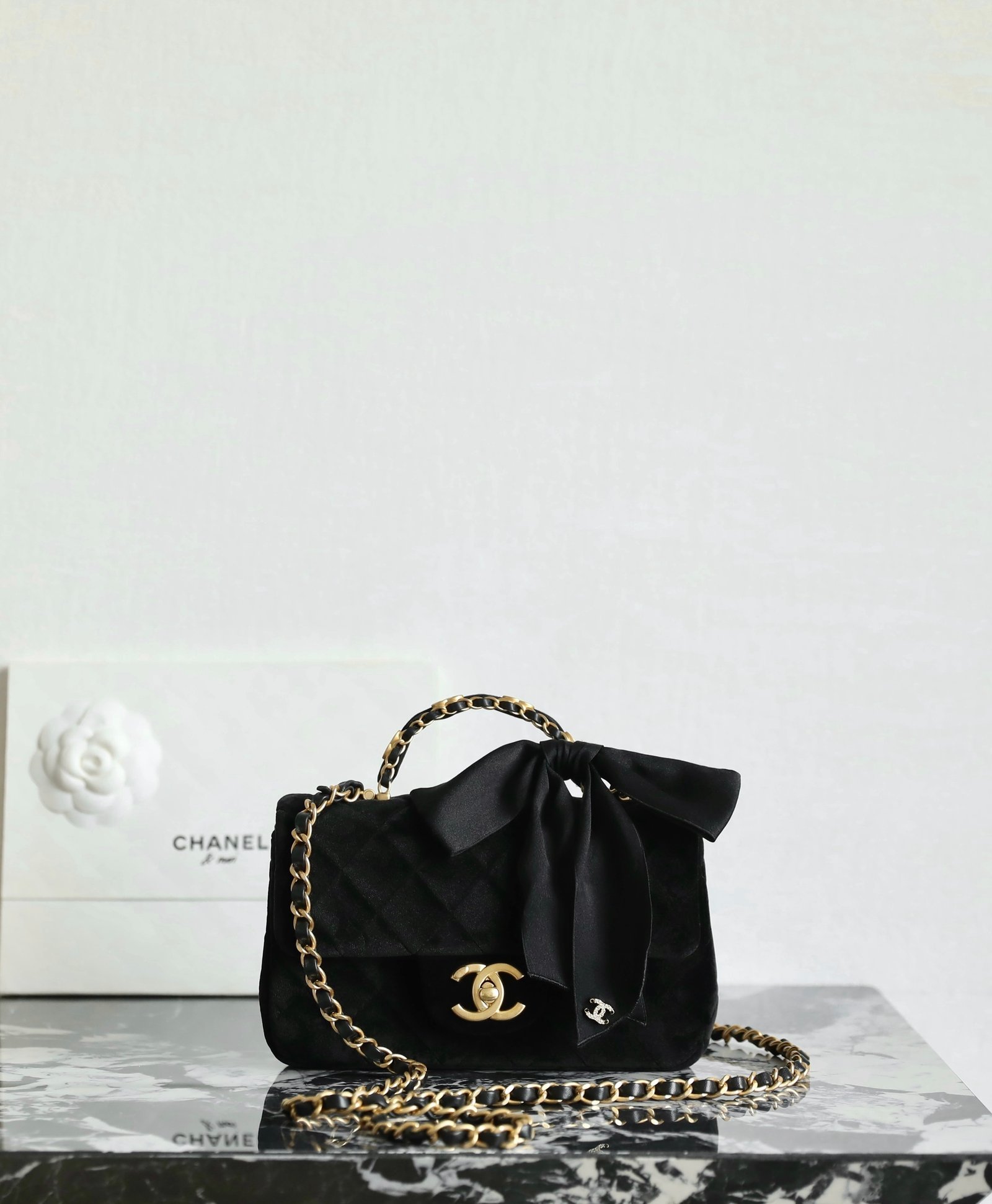 CHANEL Mini Flap Bag with Top Handle – Black Velvet & Silk with Gold-Tone Metal detail image 1 sourced from womanlvbag.com