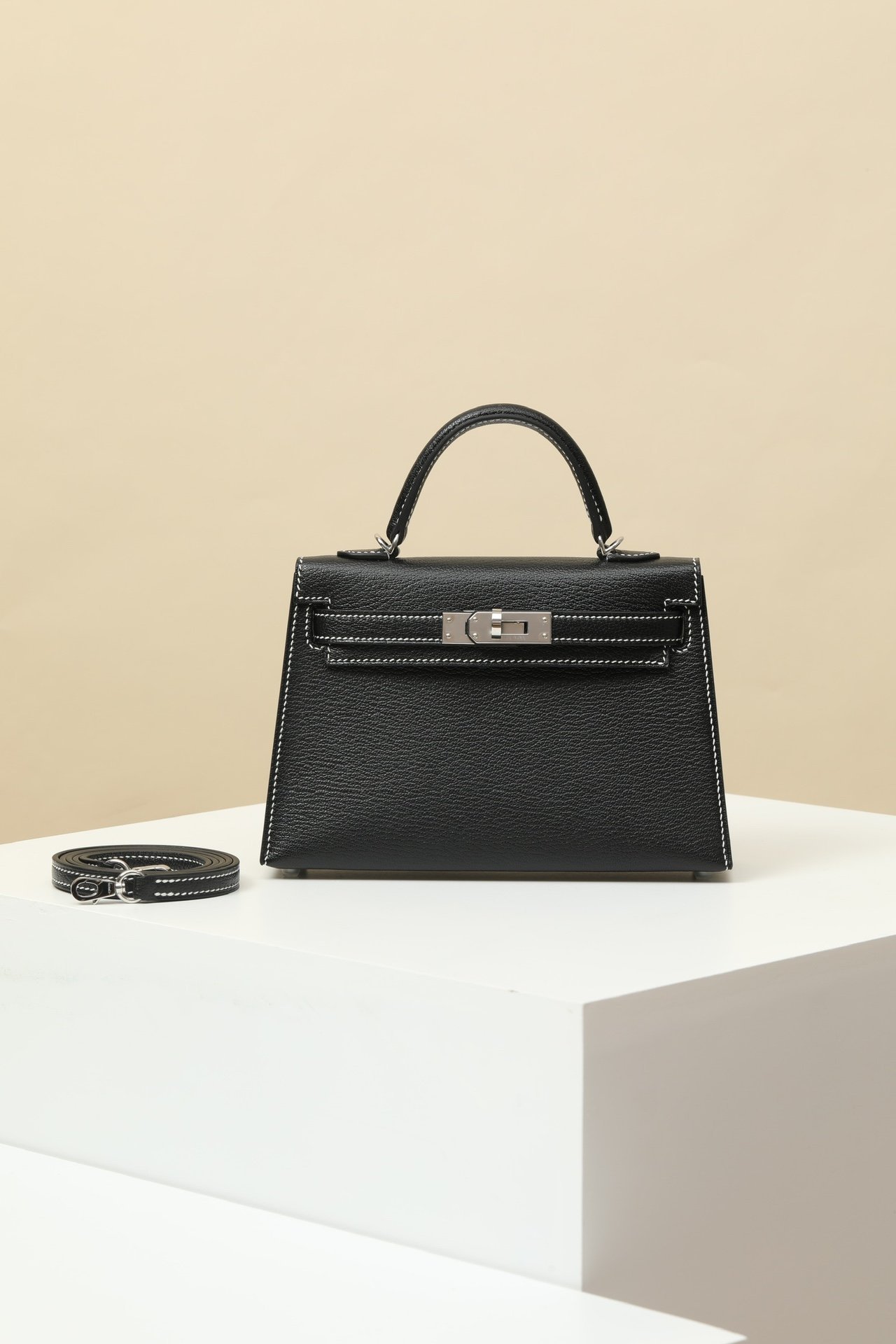 Hermès Mini Kelly II 19 – Chèvre Leather in Noir (89) & Jaune Ambre (9D) PHW detail image 1 sourced from womanlvbag.com