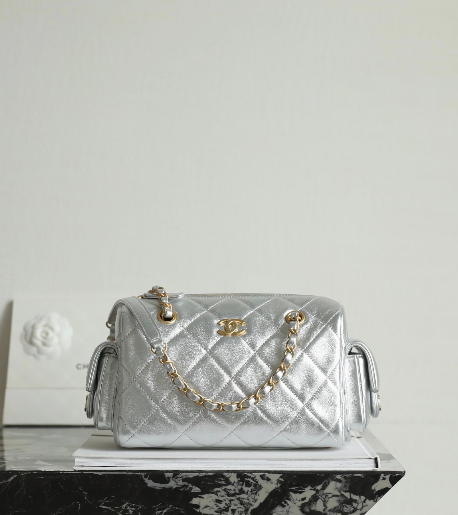 CHANEL Metallic Silver Hobo Bowling Bag – Calfskin & 24K Vintage Gold detail image 1 sourced from womanlvbag.com