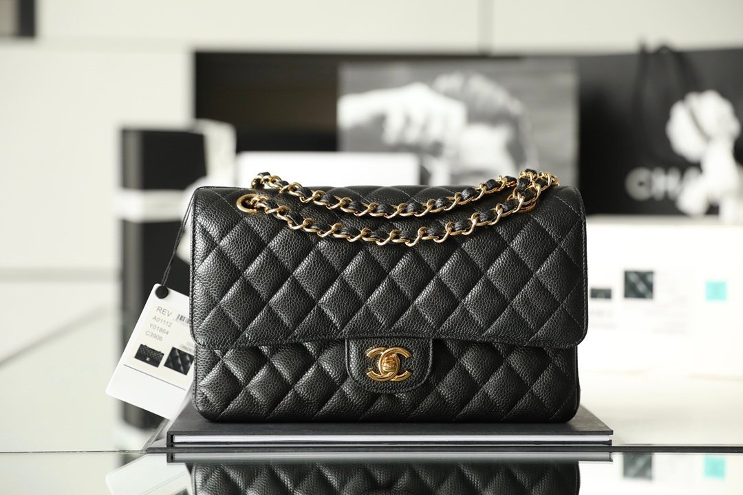 CHANEL Medium Classic Double Flap Bag – Black Caviar Leather with 24K Shiny Gold Hardware detail image 1 sourced from womanlvbag.com