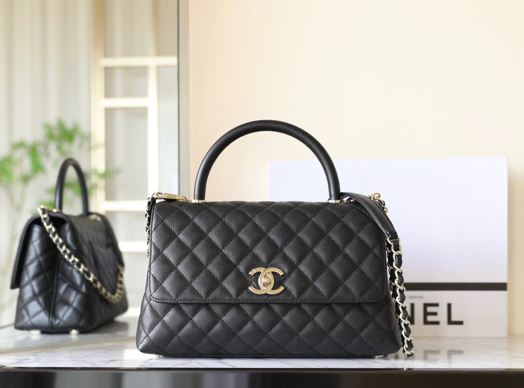 CHANEL Medium Coco Handle Bag – Black Caviar Leather with Black Lizard-Embossed Handle & 14K Light Gold Hardware detail image 1 sourced from womanlvbag.com