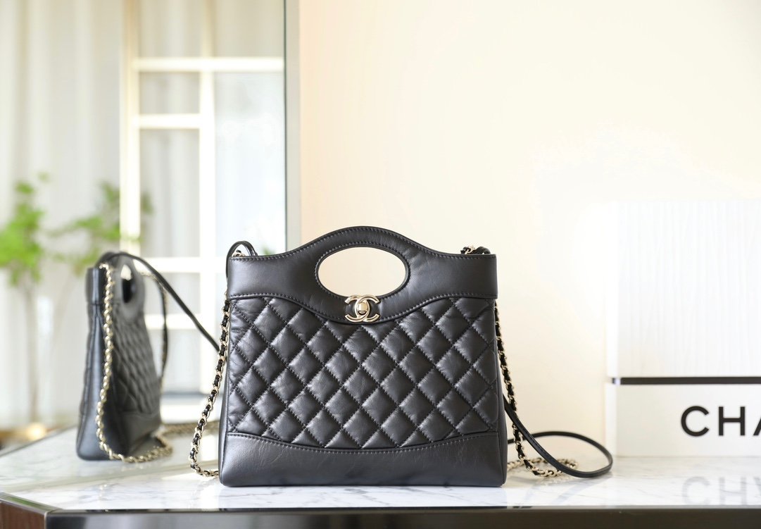 CHANEL 31 Nano Shopping Bag – Black Shiny Crumpled Calfskin with 14K Light Gold Hardware detail image 1 sourced from womanlvbag.com