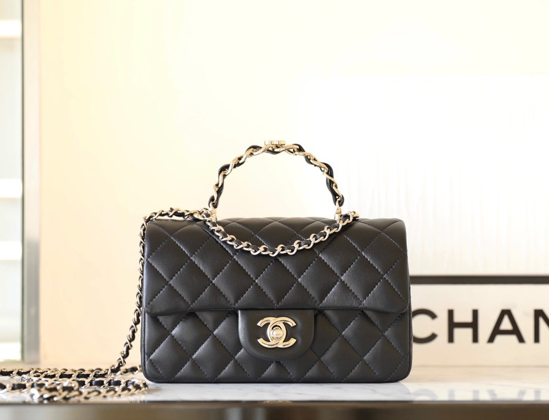 CHANEL Double CC Top Handle Flap Bag – Black Lambskin Leather with 14K Light Gold Hardware detail image 1 sourced from womanlvbag.com