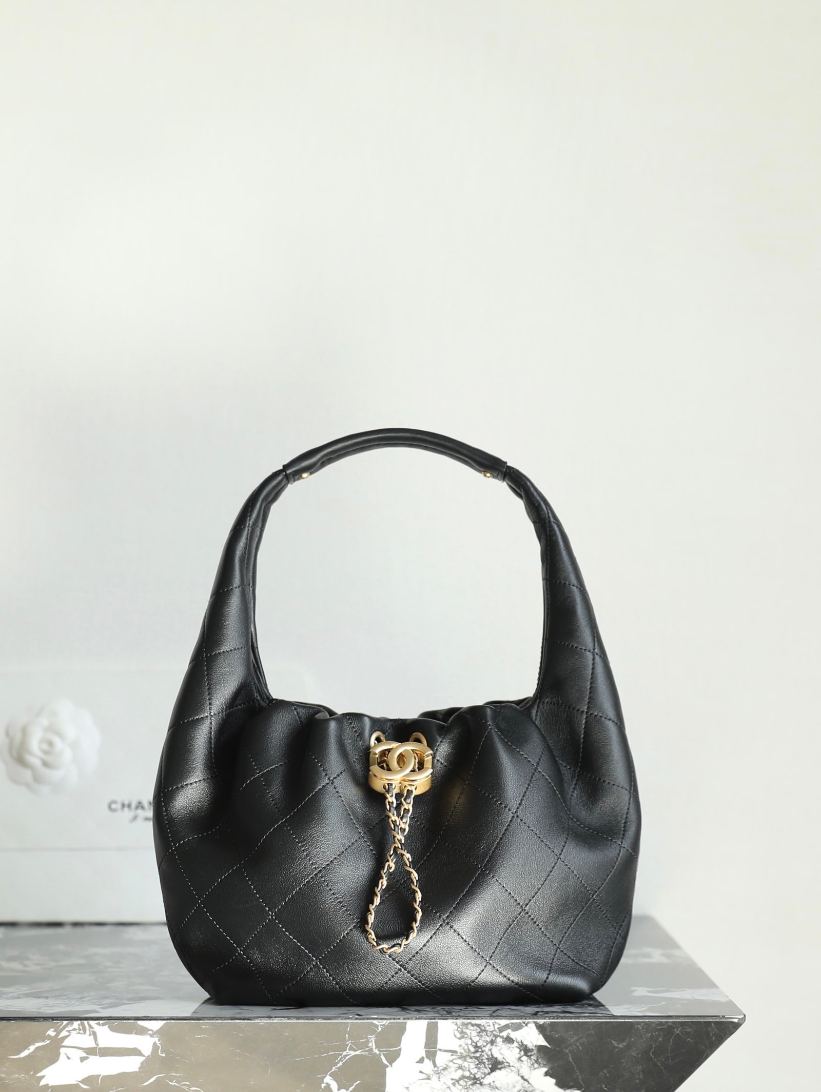 CHANEL Hobo Handbag – Black Calfskin with 24K Vintage Gold Chain & CC Adjuster detail image 1 sourced from womanlvbag.com