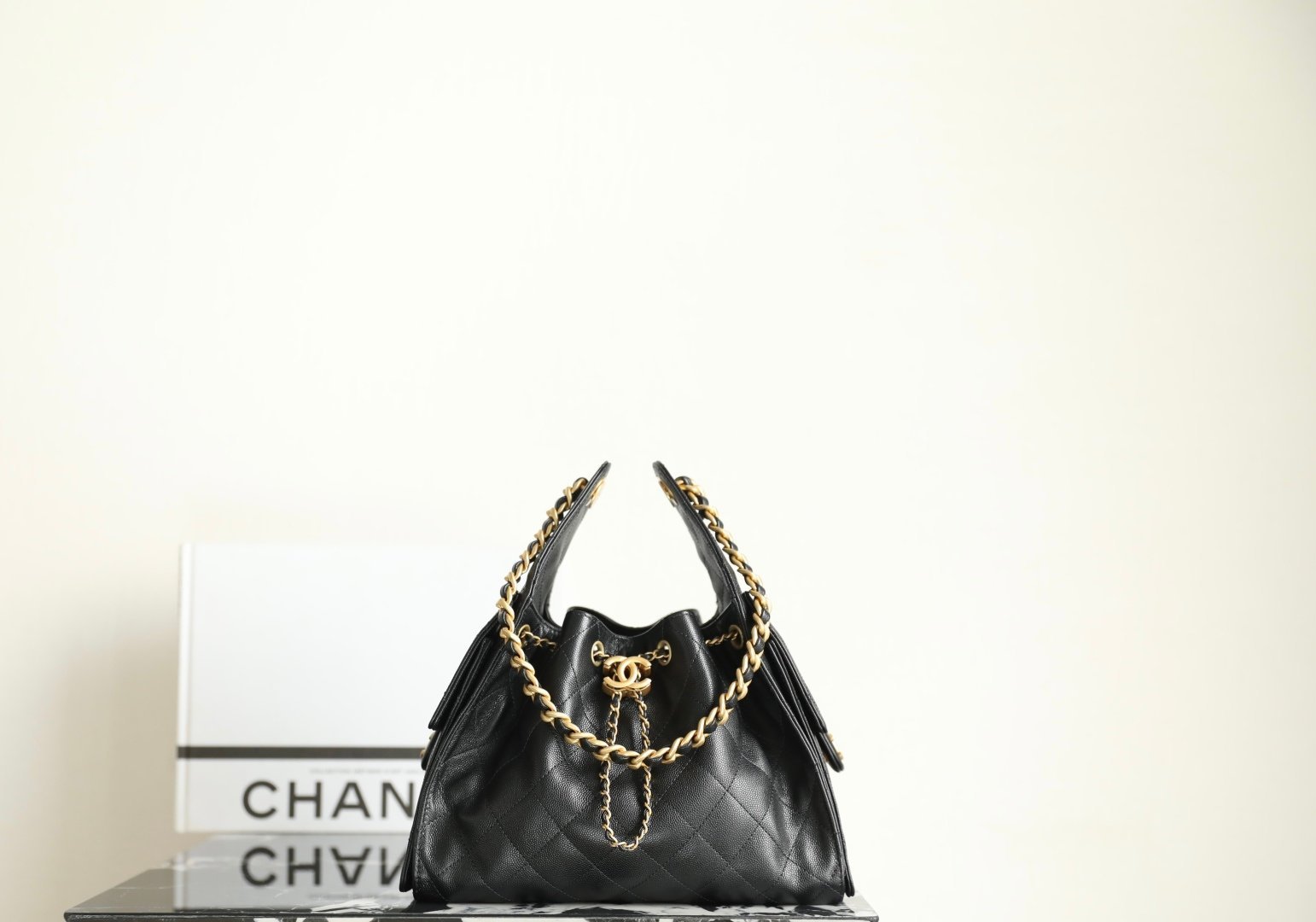 Chanel 25 Small Hobo Bag Black with Gold Hardware detail image 1 sourced from womanlvbag.com