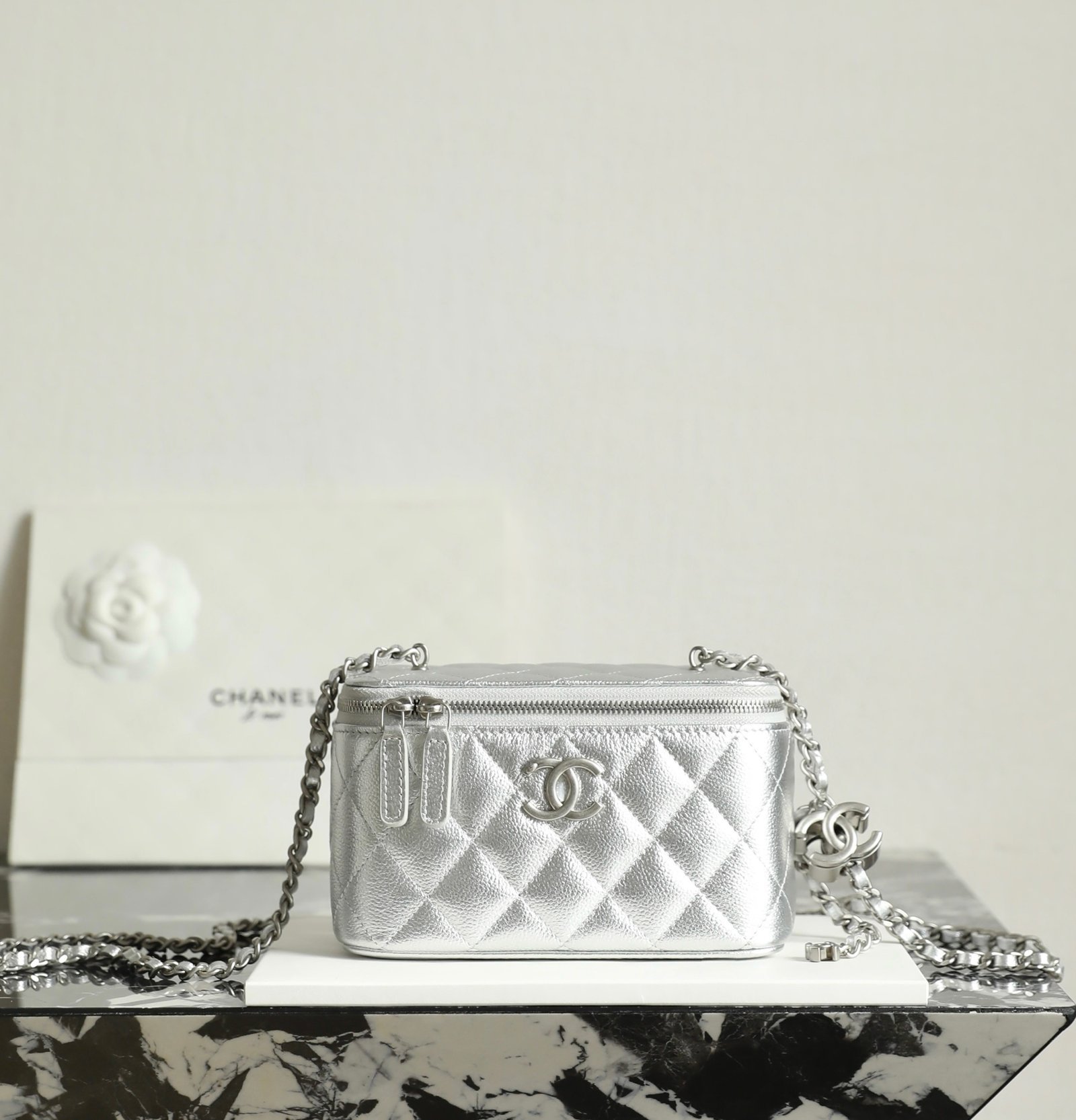 CHANEL Vanity with Chain – Metallic Silver Caviar & Vintage Silver Hardware detail image 1 sourced from womanlvbag.com