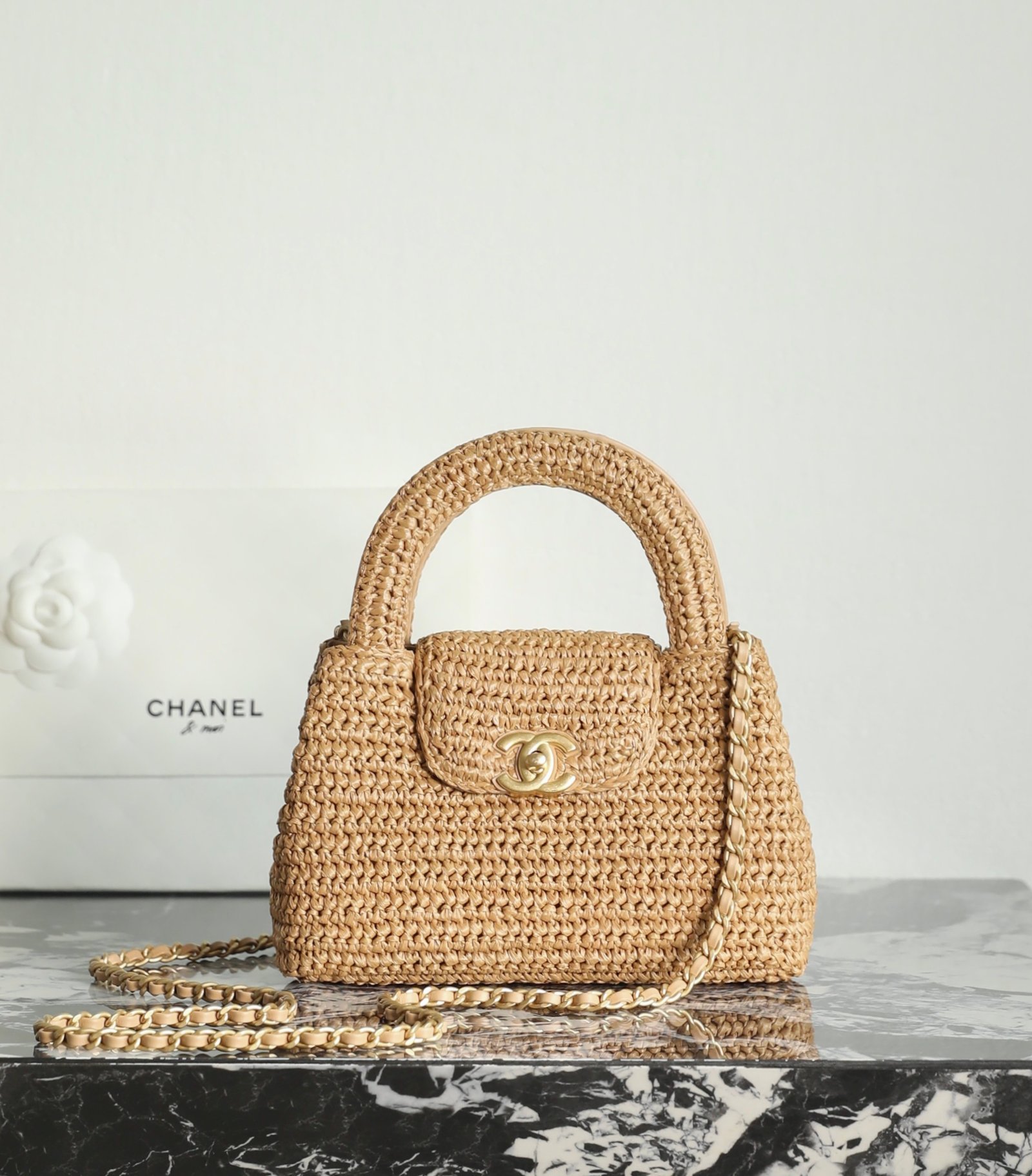 Chanel Mini Kelly Shopping Bag Braided Raffia & Dark Beige with 24K Gold Hardware detail image 1 sourced from womanlvbag.com