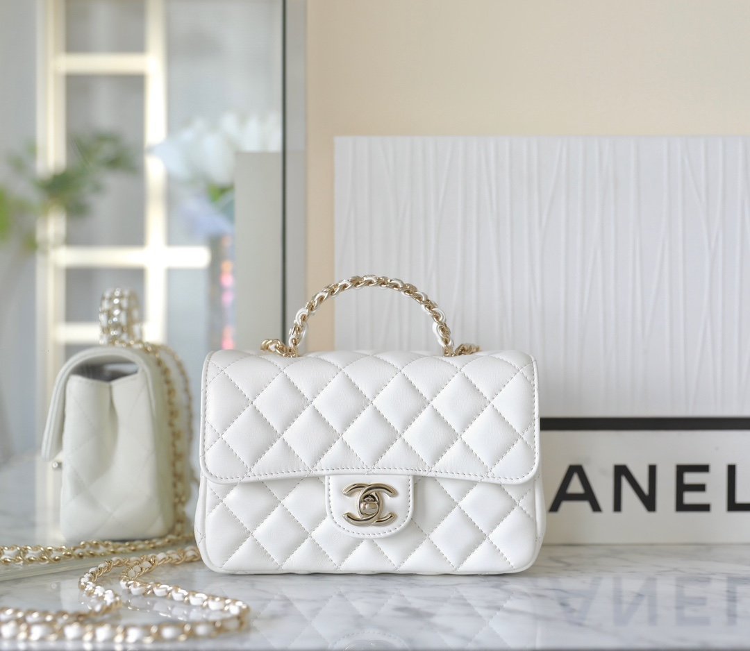 CHANEL Mini Classic Flap Bag with Crystal-Embedded Bijoux Handle – White Lambskin with 14K Light Gold Hardware detail image 1 sourced from womanlvbag.com