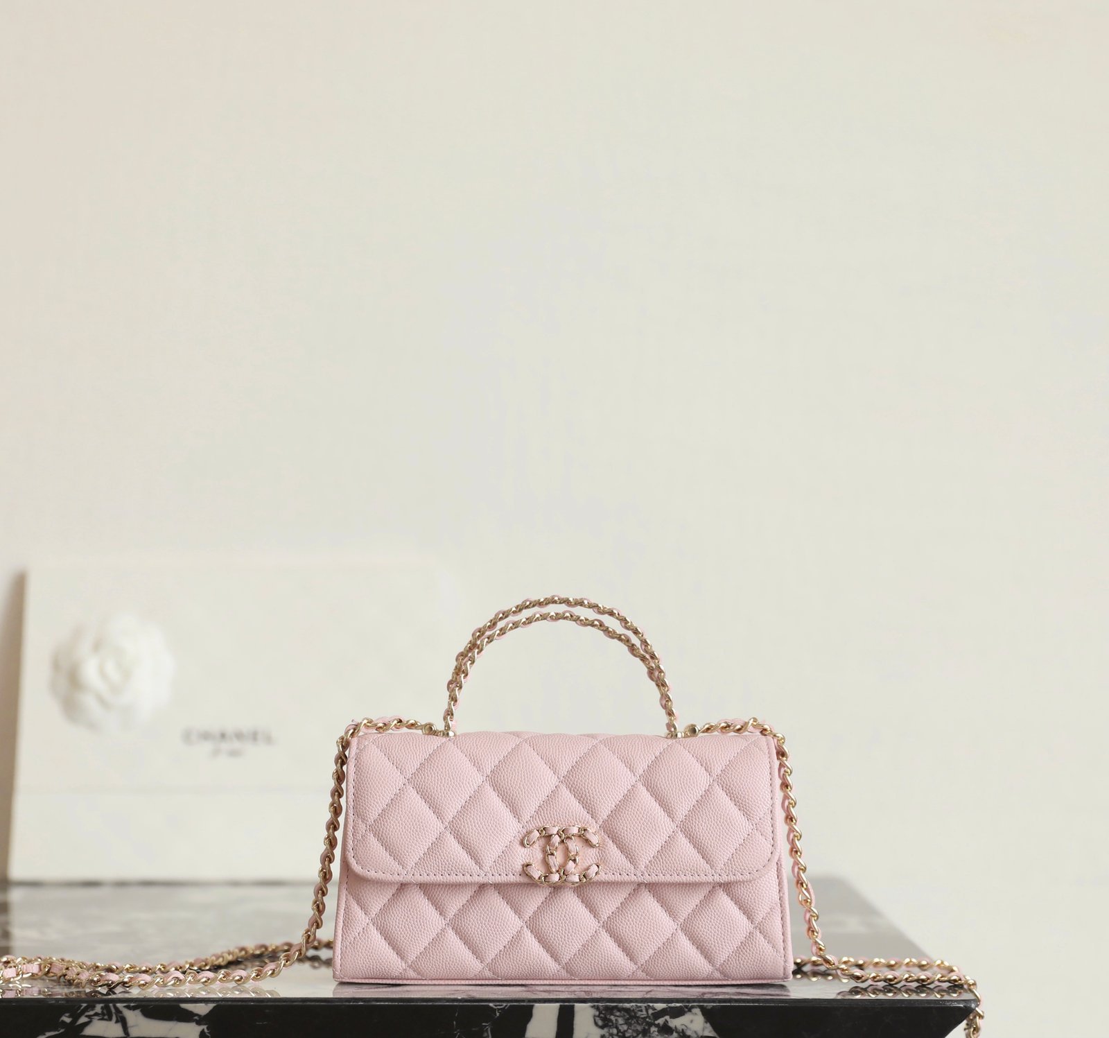 CHANEL Mini Kelly Crisscross Handle Flap Bag – Light Pink Caviar with 14K Light Gold Hardware detail image 1 sourced from womanlvbag.com